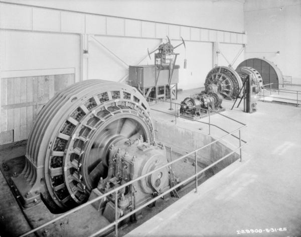 Elevated view of power generators in a factory.