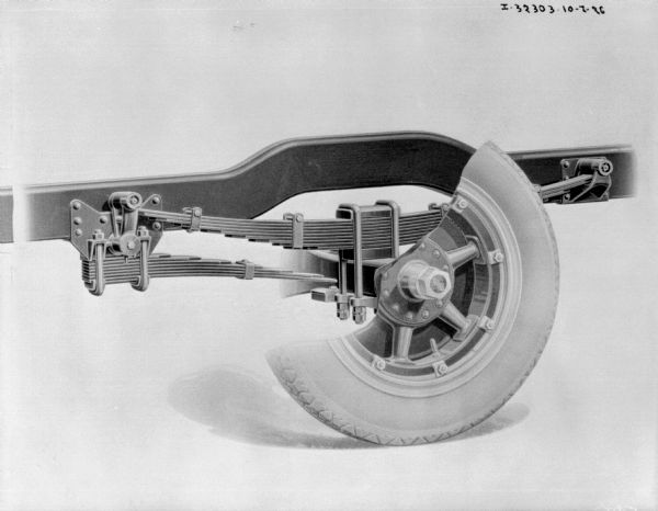 Cutaway view of a wheel with truck parts.