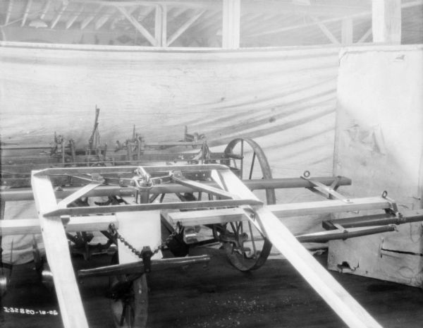 Cultivator on display in a room with a white cloth in the background for a backdrop.