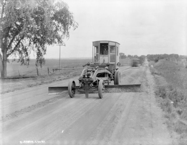 Grader on Road | Photograph | Wisconsin Historical Society