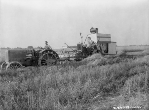 Man Driving Tractor to Pull Harvester-Thresher | Photograph | Wisconsin ...