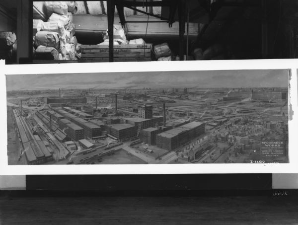 Drawing by H.M. Pettit of an aerial view of McCormick Works in Chicago. In the background is a storage area.