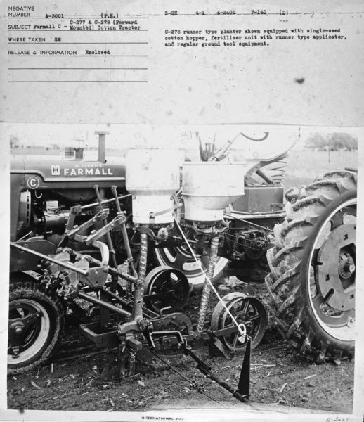 Left side view of tractor.
Subject: "Farmall C - C-277 & C-278 (Forward Mounted) Cotton Tractor." Where Taken: "SE." Information with photograph reads: "C-278 runner type planter shown equipped with single-seed cotton hopper, fertilizer unit with runner type applicator, and regular ground tool equipment."