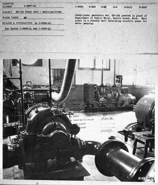 Subject: "Municipalities." Where Taken: "MW." Information with photograph reads: "Ready-Power Generator Set, UD-18A powered in plant of Department of Public Works, Battle Creek, Mich. This plant is a standby unit furnishing electric power for water pumping."