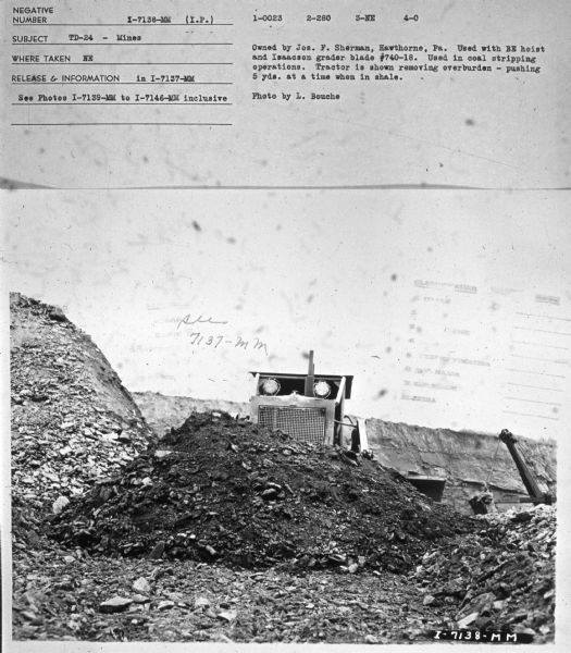 Subject: "TD-24 — Minesg." Where Taken: "NE." Information with photograph reads: "Owned by Jo. F. Sherman, Hawthorne, Pa. Used with BE hoist and Isaacson grader blade #740-18. Used in coal stripping operations. Tractor is shown removing overburden - pushing 5 yds. at a time when in shale. Photo by L. Bouche."