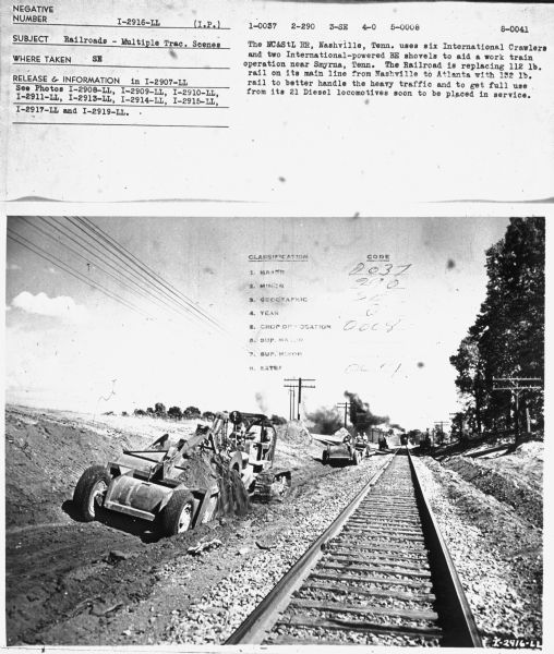 Subject: "Railroads — Multiple Trac. Scenes." Where Taken: "SE." Information with photograph reads: "The NC&StL RR, Nashville, Tenn. uses six International Crawlers and two International-powered BE shovels to aid a work train operation near Smyrna, Tenn. The Railroad is replacing 112 lb. rail on its main line from Nashville to Atlanta with 132 lb. rail to better handle the heavy traffic and to get full use from its Diesel locomotives soon to be placed in service."