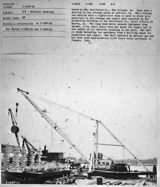 Subject: "U-9 — Material Handling." Where Taken: "SW." Information with photograph reads: "Owned by The California Co., New Orleans, La. Used with a derrick in the storage yards at Lafitte, La. This fifteen ton derrick with a eighty-foot boom is used to stock pile materials in the storage and repair yard operated by the production division of the California Co., local offices at Harvey, La. The long boom which unloas equipment from barges, lifts small boats from the water for repair and is the center of all material handling in the yard. The unit is shown unloading the machinery from a drilling barge for inspection and repair. The unit operates on natural gas and has been used approximately 4,000 hours since purchased in January, 1946."