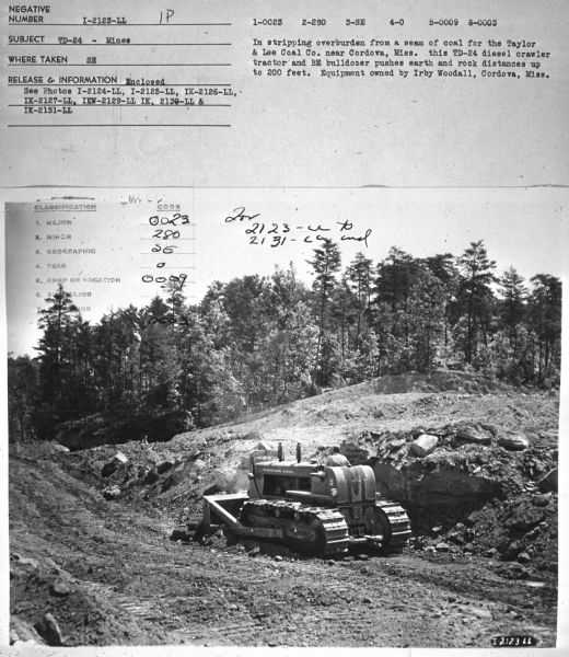 Subject: "TD-24 — Mines." Where Taken: "SE." Information with photograph reads: "In stripping overburden from a seam of coal for the Taylor & Lee Coal Co. near Cordova, Miss. this TD-24 diesel crawler tractor and BE bulldozer pushes earth and rock distances up to 200 feet. Equipment owned by Irby Woodall, Cordova, Miss."