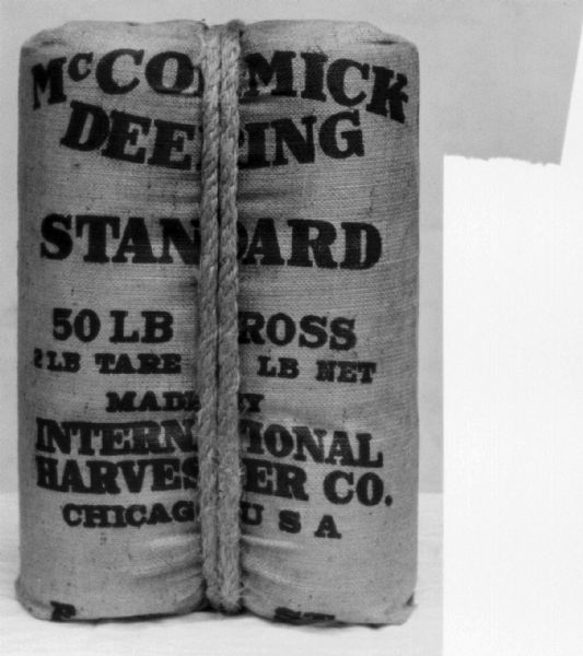 Twine bundled for shipping. Text reads: McCormick Deering, Standard, 50 LB Gross."