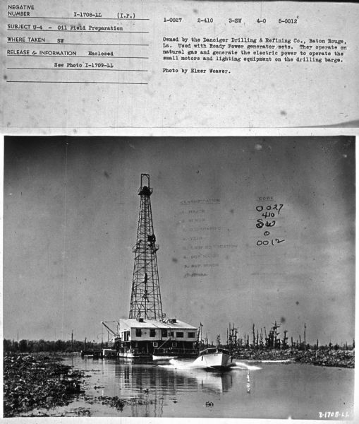 Subject: "U-4 — Oil Field Preparation." Where Taken: "SW." Information with photograph reads: "Owned by the Danciger Drilling & Refining Co., Baton Rouge, La. Used with Ready Power generator sets. They operate on natural gas and generate the electric power to operate the small motors and lighting equipment on the drilling barge. Photo by Elmer Weaver."