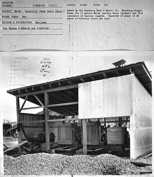 Subject: "UD-24 — Industrial Power Units (Misc.)." Where Taken: "Pac." Information with photograph reads: "Owned by the Roseburg Sand & Gravel Co., Roseburg, Oregon. Power for 15 motors which operate three crushers and five conveyors of various lengths. Capacity of plant is 60 yards of 3/4-inch stone per hour."
