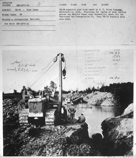 Subject: "TD-24 — Pipe Lines." Where Taken: "SW." Information with photograph reads: "TD-24 superior pipe boom owned by H.C. Price Company, Bartlesville, Okla. Finishing the laying of pipe section across he Macivor Canal near Batesville, Miss. for the Tennessee Gas Transmission Co. Four TD-18 tractors were also used."