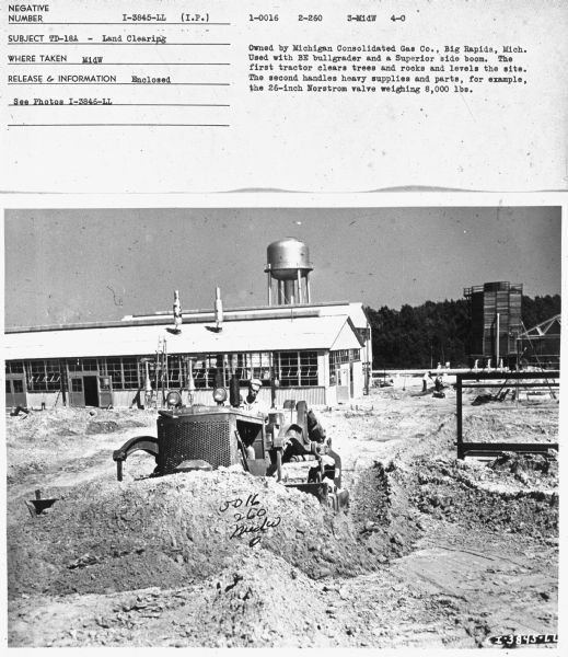 Subject: "TD-18A — Land Clearing." Where Taken: "MidW" Information with photograph reads: "Owned by Michigan Consolidated Gas Co., Big Rapids, Mich. Used with BE bullgrader and a Superior side boom. The first tractor clear trees and rocks and levels the site. The second handles heavy supplies and parts, for example, the 26-inch Norstrom valve weighing 8,000 lbs."