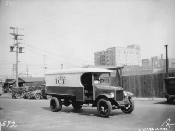 View of the passenger side of The Union Ice Company delivery truc.