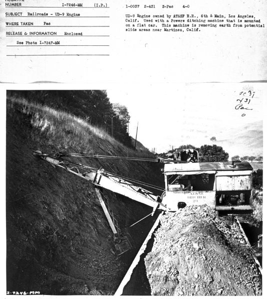 Subject: "Railroads — UD-9 Engine." Where Taken: "Pac." Information with photograph reads: "UD-9 Engine owned by AT&SF R.R., 6th & Main, Los Angeles, Calif. Used with a Powers ditching machine that is mounted on a flat car. This machine is removing earth from potential slide areas near Martinez, Calif."