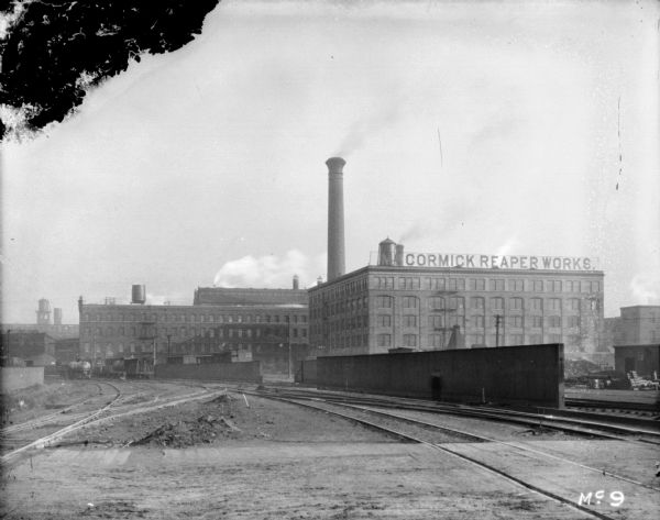 View towards McCormick Reaper Works, with railroad tracks in the foreground.