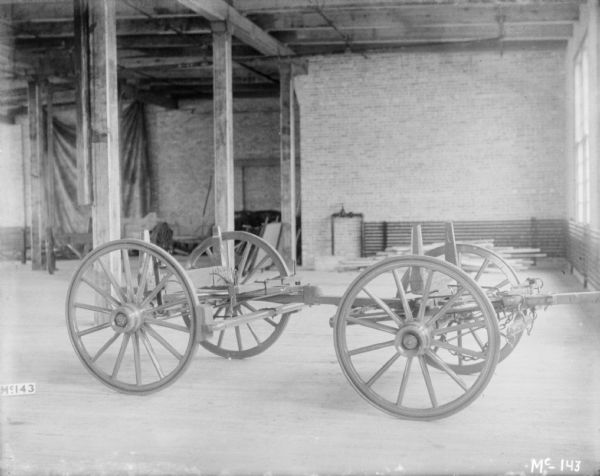 Weber Wagon chassis set up indoors at McCormick Works.