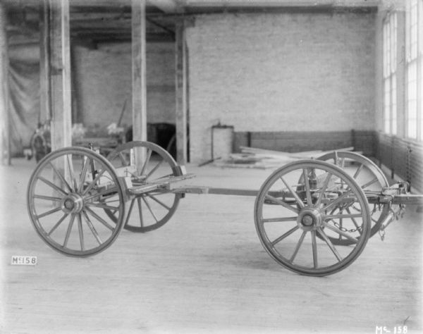 Weber Wagon chassis set up indoors at McCormick Works.