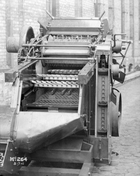 Close-up of thresher outdoors at McCormick Works.