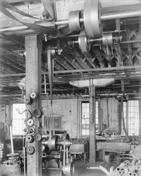 Power machines on factory floor.