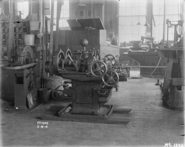 Machinery in manufacturing area indoors at McCormick Works.