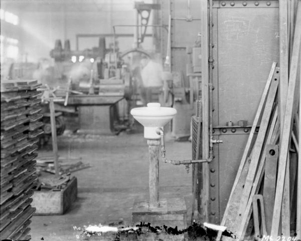 View of water fountain in manufacturing area at McCormick Works.