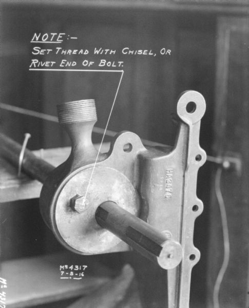 Close-up of parts. Text reads: "Note: — Set Thread with Chisel, Or Rivet End Of Bolt," with an arrow indicating bolt end location. 