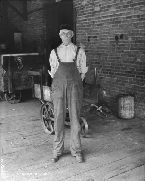 Man Posing on Loading Dock | Photograph | Wisconsin Historical Society