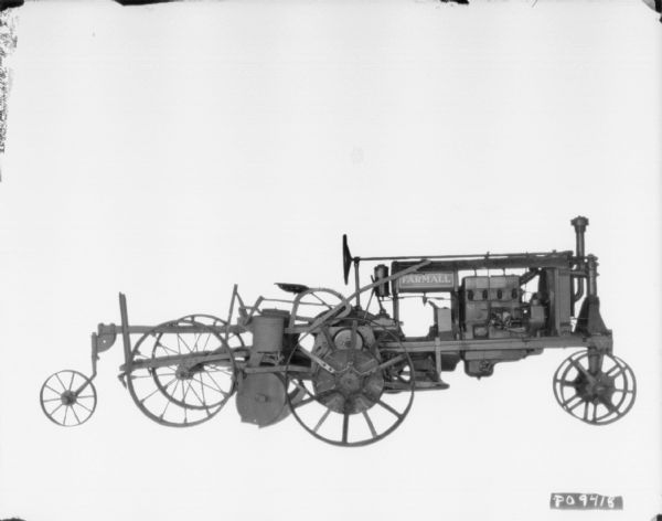 Right side, profile view of a Farmall Drawn Planter No. 34, two row, loose ground planter, "Raised."