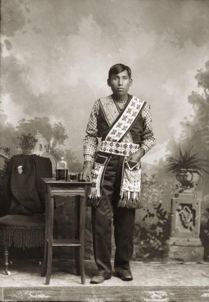 Nebraska Winnebago John Littlewalker. John is wearing two Ho-Chunk beaded bandolier bags across his chest, indicating his wealth and his status as an eligible bachelor. He later married Lucy Longtail of Nebraska.