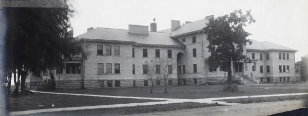 Exterior view of a Winnebago County Asylum building.