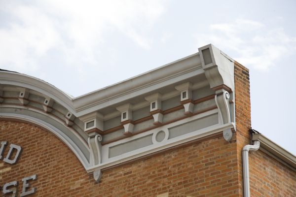 Close-up of a portion of Copeland Opera House's cornice.