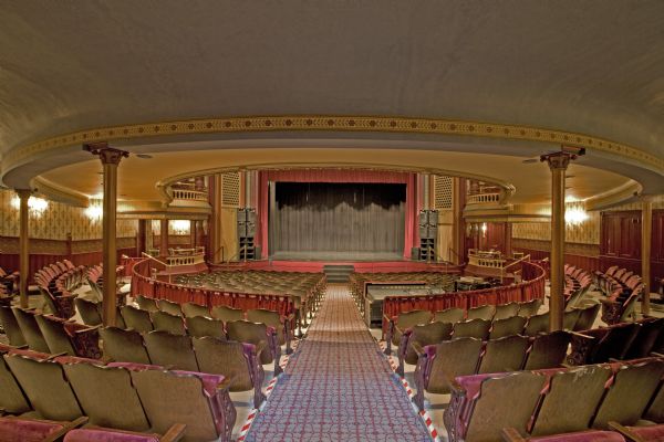 Interior of Grand Opera House's auditorium and stage from rear of house.