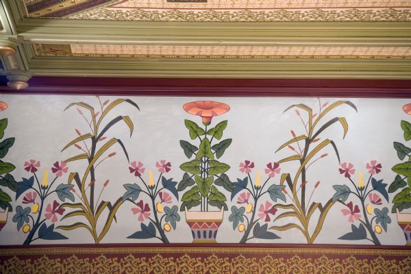 Close-up of Frank Waldo's decorative motifs in the Grand Opera House, featuring morning-glory and ornamental grass.