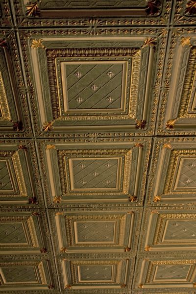 Close-up of restored embossed metal ceiling of Stoughton Opera House.