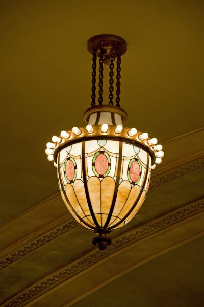 Close-up of restored gilded Tiffany glass chandelier in the Temple Theatre.