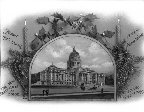 A Christmas greeting card with a view of the state capitol inset and framed on the page.  Surrounding the picture are pine, holly, candles and text: "Merry Christmas," "The New State Capitol at Boise," "Happy New Year," "Idaho Greetings."