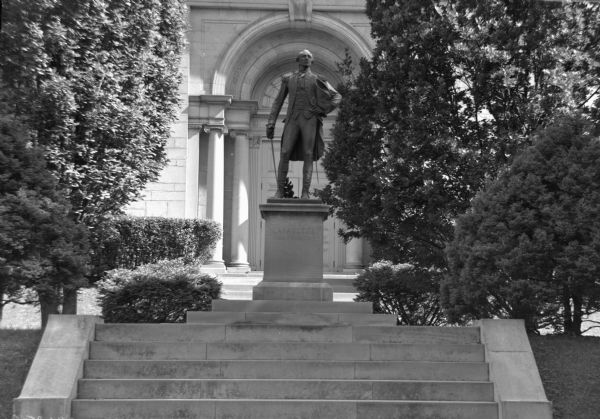 Daniel Chester French's statue commemorating the American Revolutionary War general, Marquis de Lafayette.  Installed circa, 1921, the bronze stands in front of Colton Memorial Chapel at Lafayette College.  The Chapel's arched and columned entrance frames the statue in the image.

