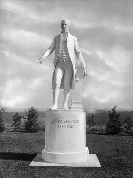 Close-up of a statue of James Monroe, the 5th president of the United States of America.  The statue stands in an open area at Ash Lawn, once Monroe's residence.