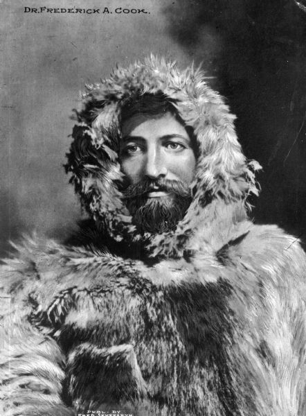 Explorer Dr. Fredrick A. Cook (6/10/1865 – 8/5/1940) in fur-lined coat with hood. Cook is notable for his claim of having reached the North Pole on 4/21/1908, a year before Robert Peary claimed to, 4/6/1909.