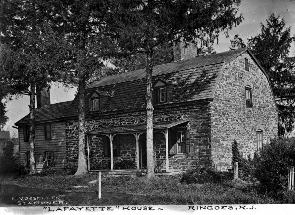 The Lafayette House, a modest stone country house, was built by Henry Landis around 1750, and boasts that Lafayette stayed inside while being treated by Dr. Gershom Craven. Caption reads: "'Lafayette' House - Ringoes, N.J."
