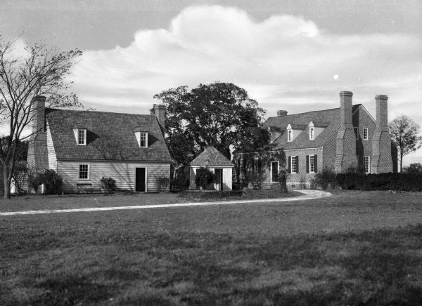 View across lawn toward colonial homes.
