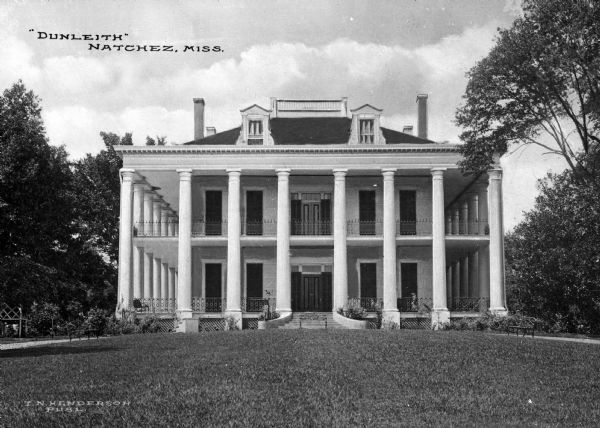 Originally "Routhland," this residence burned to the ground in 1855, but was rebuilt in 1856 in the Greek revival style and renamed "Dunleith." Caption reads: "'Dunleith' Natchez. Miss."