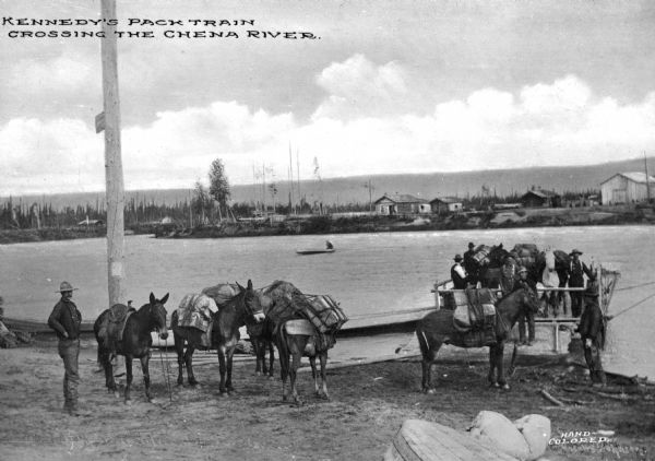 A view of Kennedy's Pack Train, about to cross the Chena River. The pack train carried large amounts of gold dust taken from creeks. Caption reads: "Kennedy's Pack Train Crossing the Chena River."