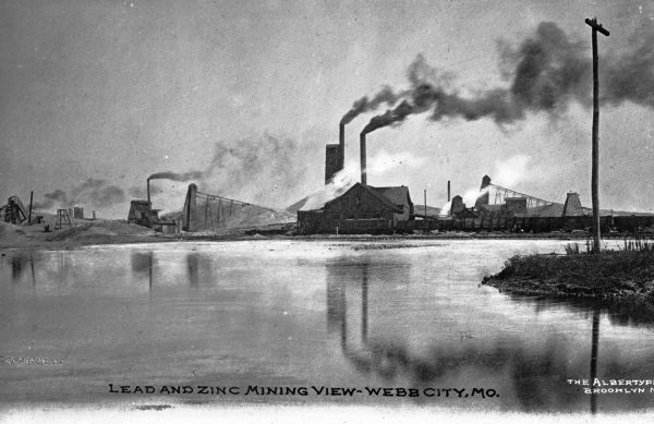 Webb City was known as the world's largest and most productive lead and zinc mining field in the late 1800s and early 1900s and was part of the "Tri-State Mining District." Caption reads: "Lead and Zinc Mining View - Webb City, MO."