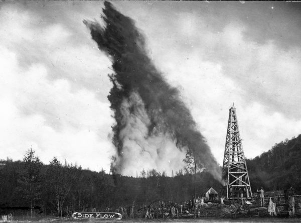 A side flow of an oil well shown in Bradford, the home town of American Refining Group oil refinery, the oldest continuously operating refinery in the United States. Oil was first discovered in Bradford Field in 1871. Caption reads: "Side Flow."
