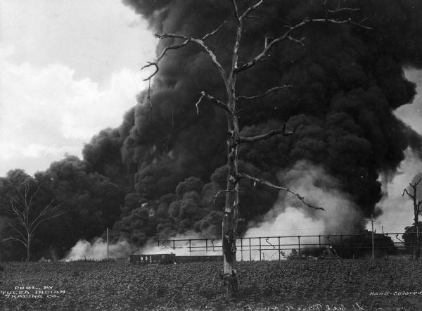 A 55,000 pound oil tank burns in Tulsa.