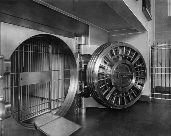 The open vault door is shown in the safety deposit department of the Norwick Savings Society.