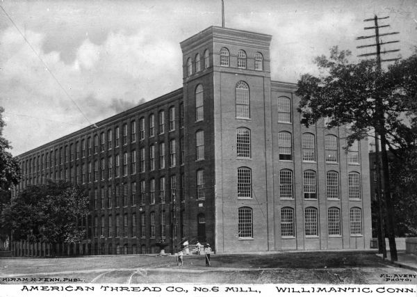 Exterior of Mill Number Six. The English Sewing Company purchased the Willimantic Linen Company England mills in 1898 and formed the American Thread Company. The company reached its height in the early 20th century, and became the largest factory in Connecticut and the largest thread mill in North America. Caption reads: "American Thread Co., NO. 6 Mill, Willimantic, Conn."