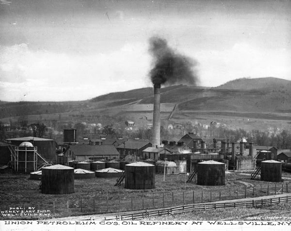 An oil refinery field of the Union Petroleum Company. Caption reads: "Union Petroleum Co's. Oil Refinery at Wellsville, N.Y."
